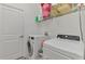 Efficient laundry room equipped with modern appliances and ample storage space at 1836 W Isles Rd, Port Charlotte, FL 33953