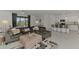 Spacious living area flows to a modern kitchen and dining area with views of the outdoors at 1836 W Isles Rd, Port Charlotte, FL 33953