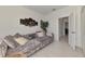 Welcoming living room with a plush sofa, ample lighting, and an open layout at 1836 W Isles Rd, Port Charlotte, FL 33953