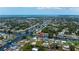 Aerial shot of neighborhood featuring waterfront homes and the canal at 18451 Goodman Cir, Port Charlotte, FL 33948
