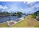 This waterfront property offers a boat lift for easy boat storage and access at 18451 Goodman Cir, Port Charlotte, FL 33948
