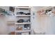 Walk-in closet providing ample storage with shelving and hanging space for organizing belongings at 18451 Goodman Cir, Port Charlotte, FL 33948