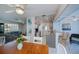 Open living area featuring dining room, kitchen, and living room at 18451 Goodman Cir, Port Charlotte, FL 33948