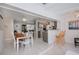 Open living area featuring dining room, kitchen, and living room at 18451 Goodman Cir, Port Charlotte, FL 33948