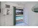 Bright room leading to a screened pool area, offering seamless indoor-outdoor living at 18451 Goodman Cir, Port Charlotte, FL 33948