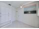 Multi-purpose room with built-in storage cabinets and neutral decor, ideal for various activities at 18451 Goodman Cir, Port Charlotte, FL 33948