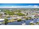 Waterfront community showcasing canal access, private boat docks, lush landscaping, and convenient residential streets at 18790 Countryman Ave, Port Charlotte, FL 33948
