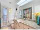 Bathroom with neutral vanity and shower and tub combination at 18790 Countryman Ave, Port Charlotte, FL 33948