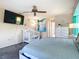 Comfortable main bedroom with large TV and ample closet space at 18790 Countryman Ave, Port Charlotte, FL 33948