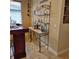 Entertain at home with the bar including marble countertop and bottle storage at 19 Medalist Way, Rotonda West, FL 33947