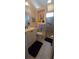 Clean bathroom featuring a vanity, toilet, and walk-in shower for modern convenience and functionality at 19 Medalist Way, Rotonda West, FL 33947