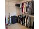 Walk-in closet boasts ample storage space with clothing racks and shelving at 19 Medalist Way, Rotonda West, FL 33947