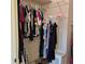 This walk-in closet has ample storage space with shelving, racks, and storage at 19 Medalist Way, Rotonda West, FL 33947
