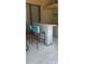 Stylish outdoor bar area with seating and countertop at 19 Medalist Way, Rotonda West, FL 33947