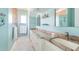 Bathroom features a granite countertop with double sinks and light blue walls at 1900 Illinois Ave, Englewood, FL 34224