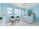 Bedroom showcasing a waterfront view and bright coastal-inspired design at 1900 Illinois Ave, Englewood, FL 34224