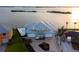 Picture-perfect waterfront home with backyard pool, lush landscaping, and circular driveway at 1900 Illinois Ave, Englewood, FL 34224