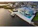 Gorgeous waterfront home with private dock, backyard pool, and patio seating at 1900 Illinois Ave, Englewood, FL 34224