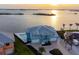 Lovely waterfront home featuring a backyard pool, a spacious driveway, and a beautiful view of the ocean at 1900 Illinois Ave, Englewood, FL 34224