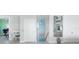 Hallway leading to an office with stylish decor and staircase access at 1900 Illinois Ave, Englewood, FL 34224