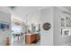 Open kitchen and dining area with waterfront views and stylish decor at 1900 Illinois Ave, Englewood, FL 34224
