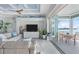 Spacious living room with a balcony overlooking the water at 1900 Illinois Ave, Englewood, FL 34224