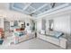Open concept living room with access to kitchen at 1900 Illinois Ave, Englewood, FL 34224