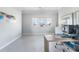 Bright office with ample natural light, a desk, and clean design at 1900 Illinois Ave, Englewood, FL 34224