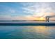 Stunning waterfront view from the beautiful backyard pool, perfect for relaxing and enjoying the ocean views at 1900 Illinois Ave, Englewood, FL 34224