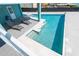 Amazing pool and hot tub with sun loungers, perfect for relaxation and entertainment in this stylish outdoor space at 1900 Illinois Ave, Englewood, FL 34224