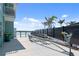 Side yard with a boat trailer, offering a private outdoor space with convenient storage and access to boating activities at 1900 Illinois Ave, Englewood, FL 34224
