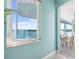 Cozy sitting area with water view, accessible from an adjoining room at 1900 Illinois Ave, Englewood, FL 34224