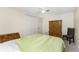 Bright bedroom with carpet flooring, ceiling fan and closet at 1965 Louisiana Ave, Englewood, FL 34224