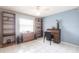 Home office with a work desk and ample shelf storage at 2125 Floribanna St, North Port, FL 34287