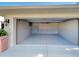 Spacious two car garage with neutral paint, lighting, and epoxy flooring at 237 Rotonda E Blvd, Rotonda West, FL 33947