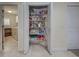Spacious walk-in pantry with organized shelving, providing ample storage space at 237 Rotonda E Blvd, Rotonda West, FL 33947