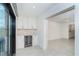 Wet bar with white cabinets, wine fridge, and marble counters at 2700 N Beach Rd # A201, Englewood, FL 34223