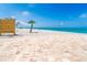 Charming beachfront with brick paver patio and tropical palms at 2700 N Beach Rd # A201, Englewood, FL 34223