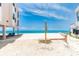 Beautiful beach with beach shower, brick paver patio, and ocean view at 2700 N Beach Rd # A201, Englewood, FL 34223