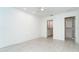 Bedroom featuring neutral walls, updated flooring and en-suite bathroom at 2700 N Beach Rd # A201, Englewood, FL 34223