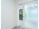 Bedroom doorway with frosted glass and modern finishes throughout at 2700 N Beach Rd # A201, Englewood, FL 34223