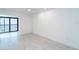 Bright bedroom featuring updated floors, light walls and ceiling fan at 2700 N Beach Rd # A201, Englewood, FL 34223