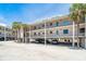Exterior view of the property showcasing its raised design and ample parking at 2700 N Beach Rd # A201, Englewood, FL 34223