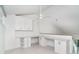 Bright office space featuring custom desk and upper cabinets at 2700 N Beach Rd # A201, Englewood, FL 34223