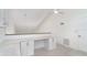 Office area with built-in desk and cabinets on the second floor at 2700 N Beach Rd # A201, Englewood, FL 34223