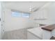 Office space featuring custom built-in desk and storage at 2700 N Beach Rd # A201, Englewood, FL 34223