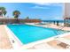 Community pool and spa, plus views of beach and the Gulf at 2700 N Beach Rd # A201, Englewood, FL 34223