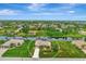 Serene waterfront home showcasing an expansive backyard and a private canal setting in a quiet neighborhood at 29 Tournament Rd, Rotonda West, FL 33947