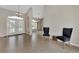 Welcoming foyer with tile floors and double front doors, creating a bright and airy entrance at 29 Tournament Rd, Rotonda West, FL 33947