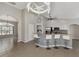 Bright, open kitchen with breakfast bar and stainless steel appliances at 29 Tournament Rd, Rotonda West, FL 33947
